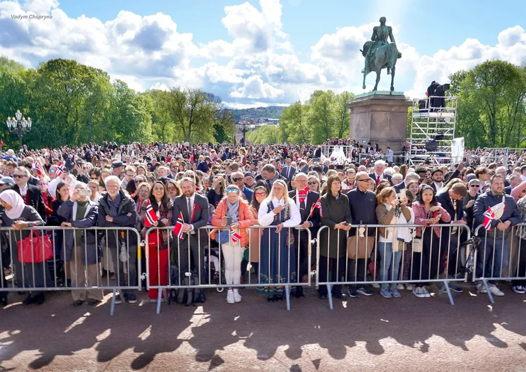 Spectators at Palace Square near the King Karl Johan statue watching the parade in Oslo Norway on May 17th 2026