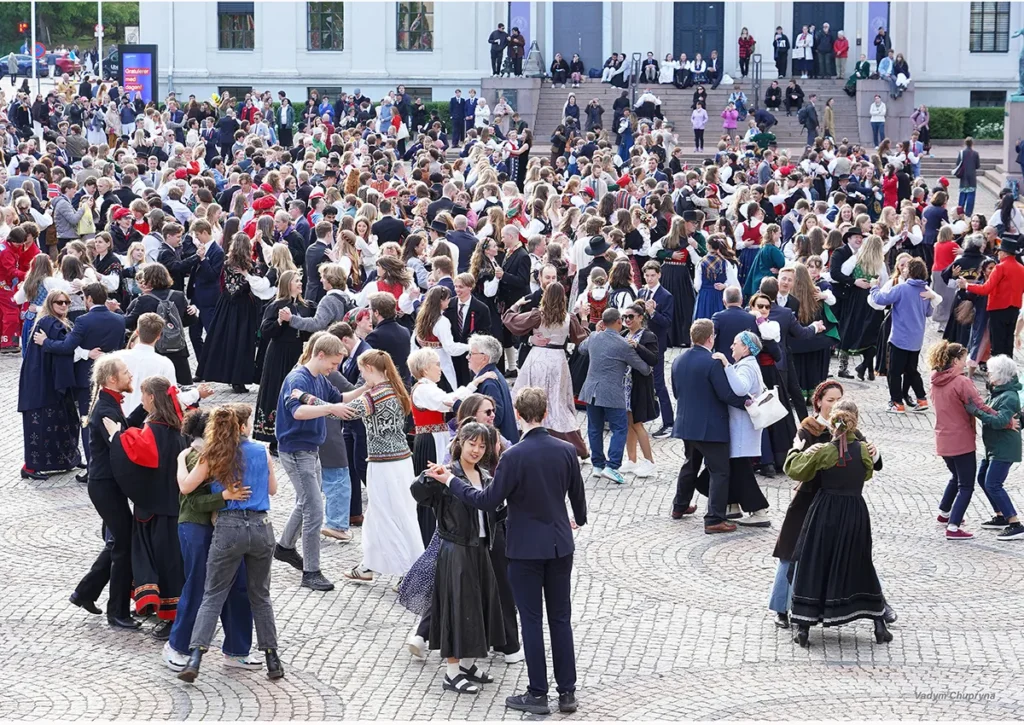 People dancing at University Square during National Day celebrations in Oslo Norway on May 17th 2026